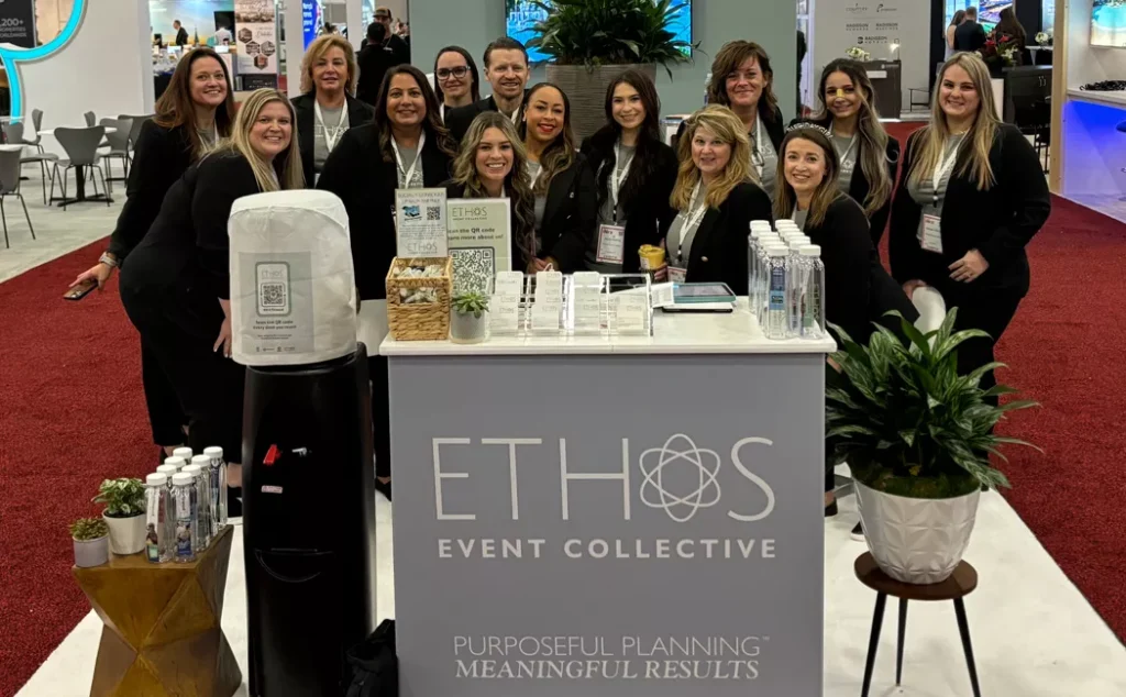 A group picture of Ethos staff at an event.