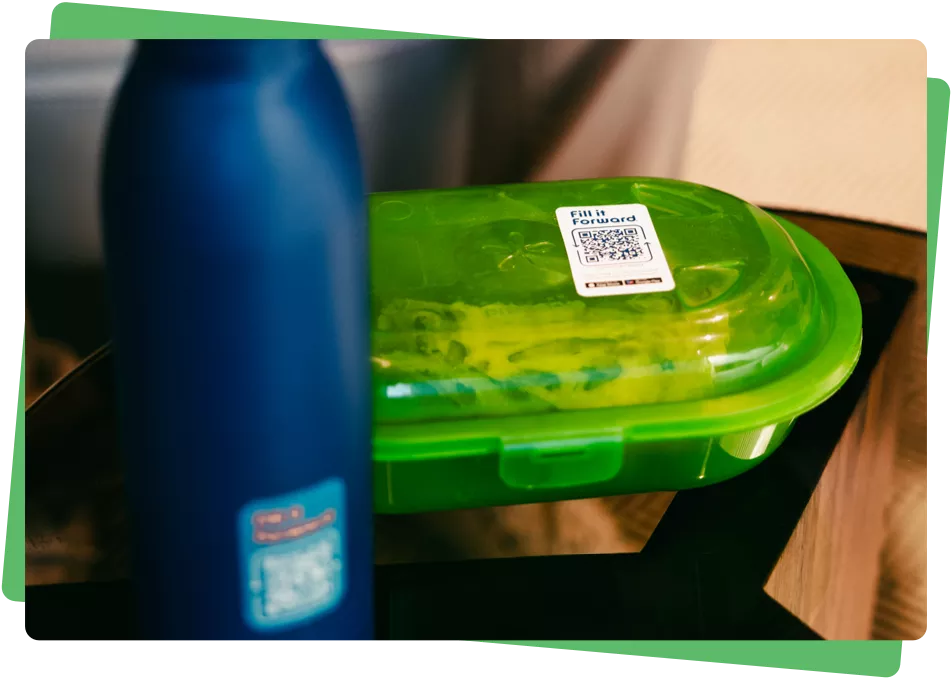 photo of fill it forward smart stickers on different reusable products