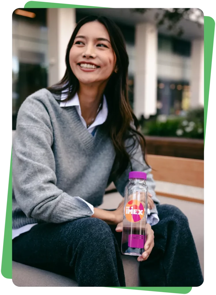 woman sitting with cupanion waterbottle