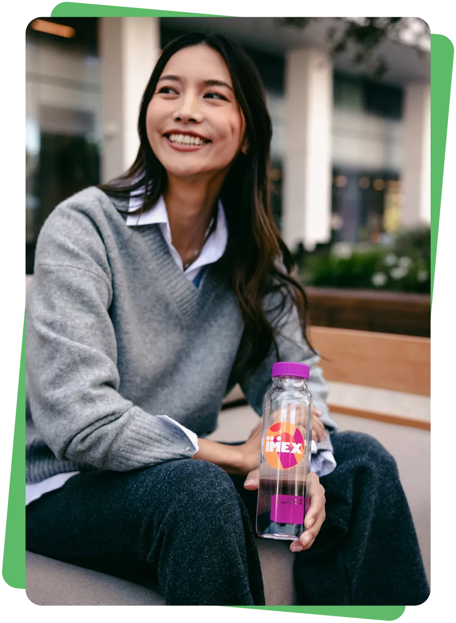 woman sitting with cupanion waterbottle